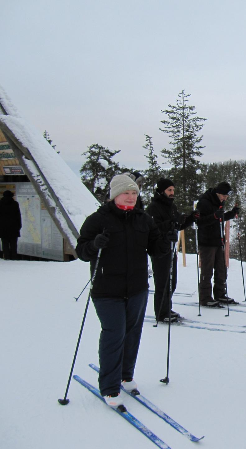 Happy skier (and 2 random French dudes)